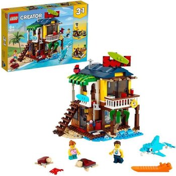 LEGO® Creator 3-en-1 31118 La maison sur la plage du surfeur Set incluant une cabane avec piscine, un phare et des animaux